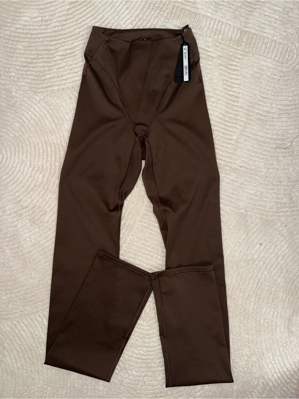 NIKE SKIMS V PANNEL matte dark sephia Straight Leg Leggings in Chocolate Brown